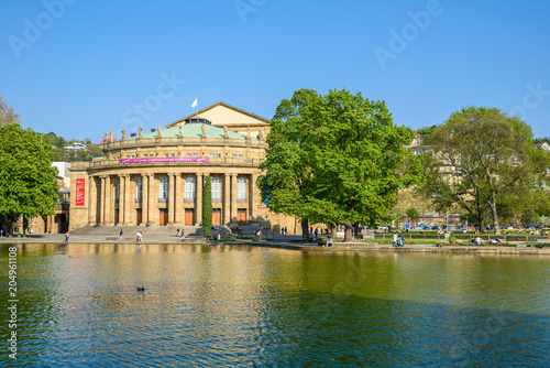 Stuttgart State Theatre Opera building and fountain in Eckensee lake, Germany