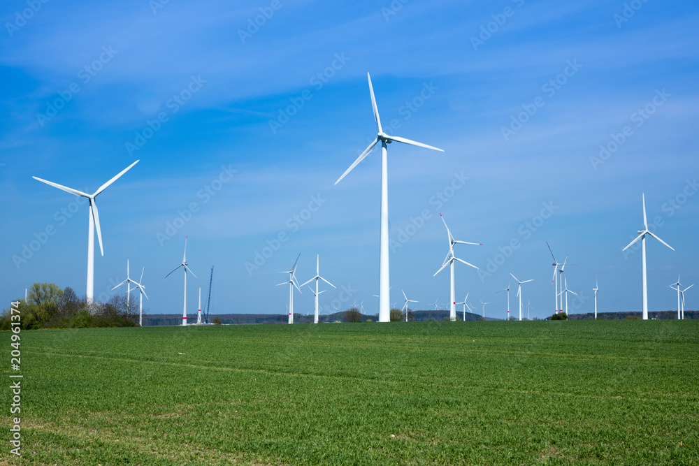 Large wind farm on agricultural area at Paderborn, North Rhine-Westphalia, Germany, Europe Large wind farm on agricultural area at Paderborn, North Rhine-Westphalia, Germany, Europe