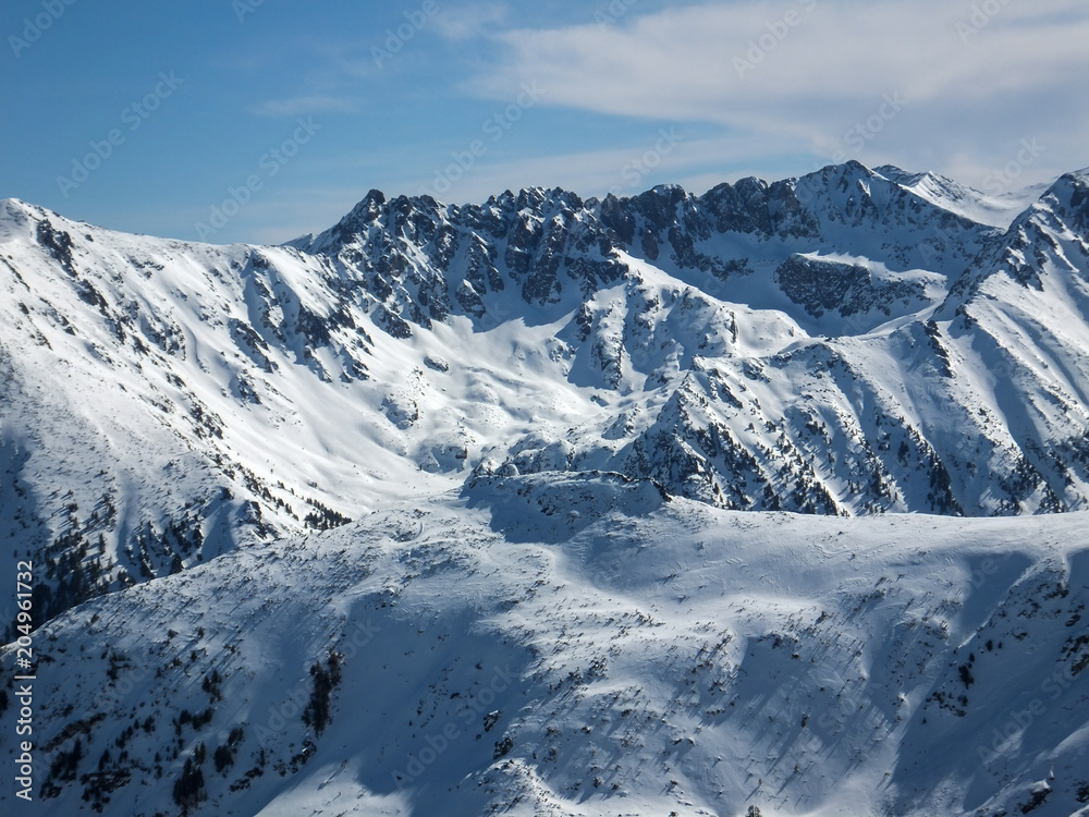 Amazing winter landscape of Polezhan peak from Todorka peak, Pirin Mountain, Bulgaria