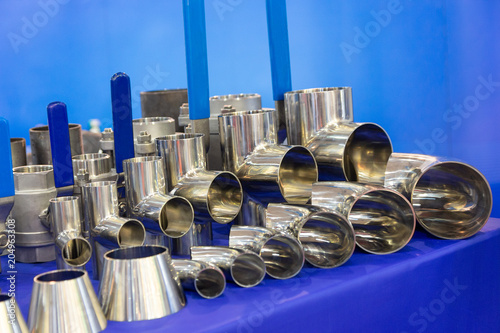 Taps valves and fittings on sanitary equipment exhibition. Industry