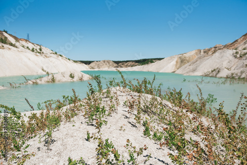 Volkovysk chalkpits or Belarusian Maldives is a beautiful saturated blue lakes. Famous chalk quarries near Vaukavysk, Belarus. Developed for the needs of Krasnaselski plant construction materials.  photo