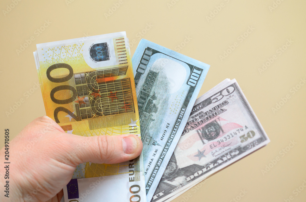One hundred and fifty dollar bills, spread out in a fan. One hundred and fifty dollar bills, spread out in a fan.