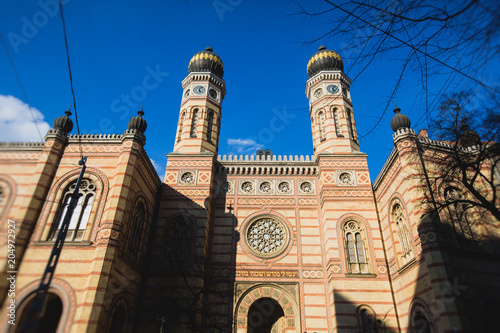 The Dohany Street Synagogue facade exterior in Budapest with blue sky, the biggest sinagogue in Europe, Hungary photo