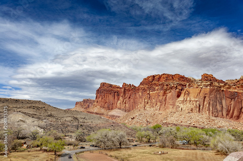 Capitol Reef National Park, Utah. Capitol Reef is a 100-mile pinch in the earth’s crust with layers of golden sandstone, canyons and striking rock formations making up a geological waterpocket fold.