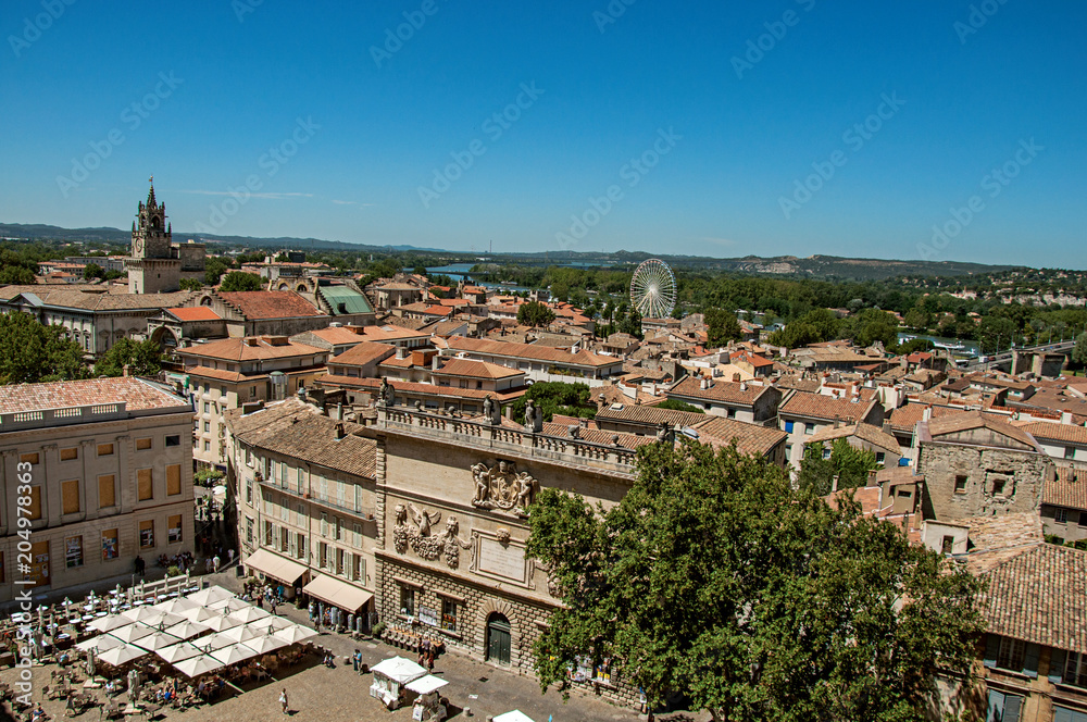 Panoramic view of the city of Avignon, under a sunny blue sky. Located in the Vaucluse department, Provence-Alpes-Côte d'Azur region, southeastern France