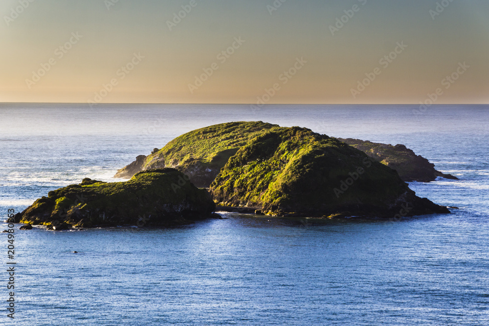 Penguin Island in Chiloe that is another island in south Chile, here we can see the island isolated in the middle of the ocean