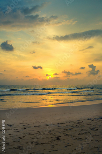 Fototapeta Naklejka Na Ścianę i Meble -  Sunset on the shores of the Indian Ocean, Bentota, Sri Lanka
