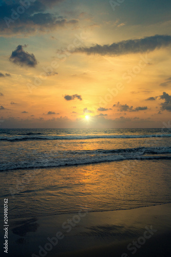 Sunset on the shores of the Indian Ocean, Bentota, Sri Lanka