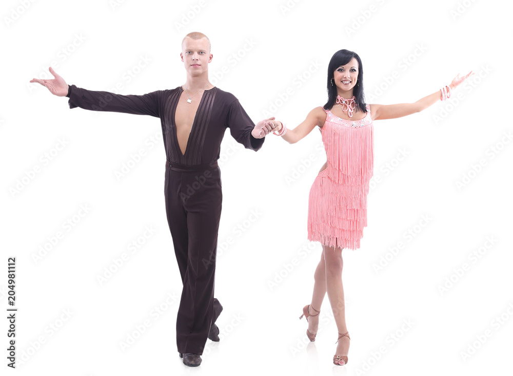 Two young ballroom dancers in studio against white background Two young ballroom dancers in studio against white background