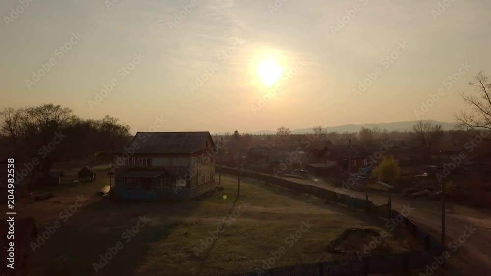  Top aerial viev the remote village of the small and the indigenous peoples of the North Udege Red Yar. Traditional way of life. Authenticity.