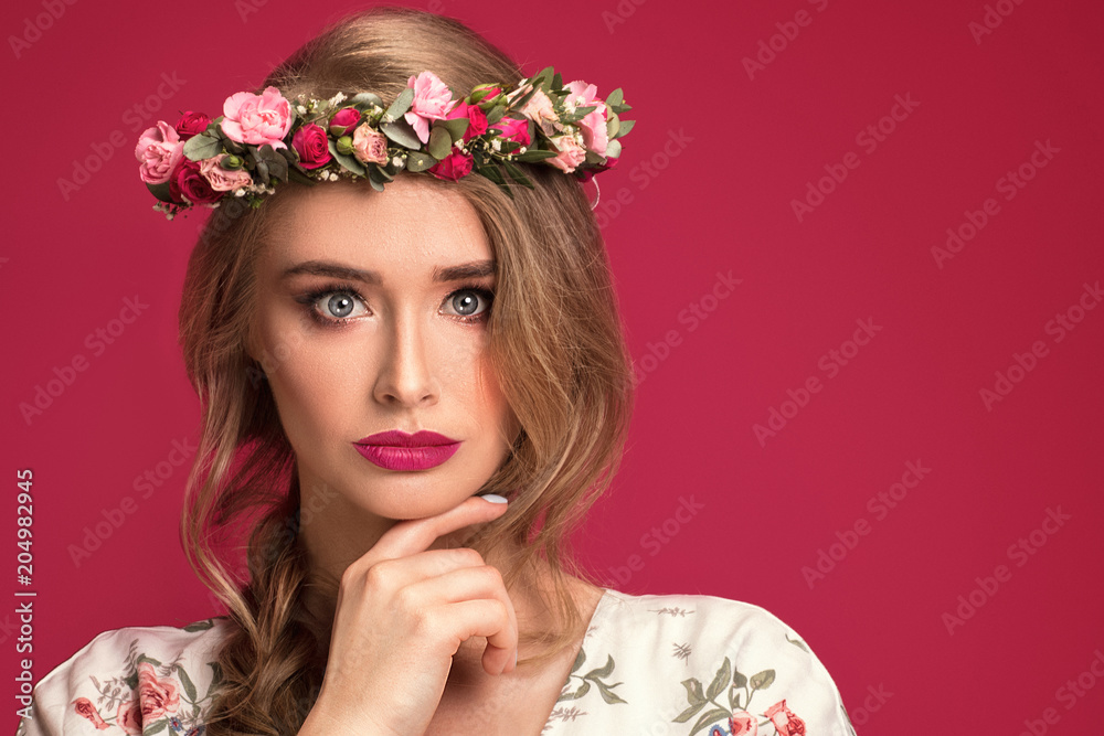 Beauty female model with flowers headband.