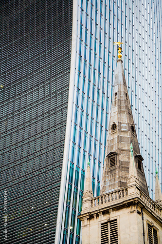 Modern architecture standing together with the old building in London photo