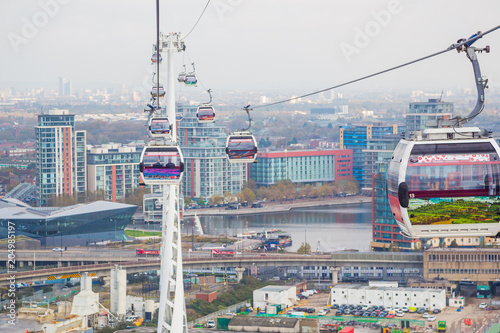 The one kilometre, 0.63 mile, long cable car link travels 90 metres, above the River Thames from the Greenwich North Peninsula to the Royal Docks in London, UK.