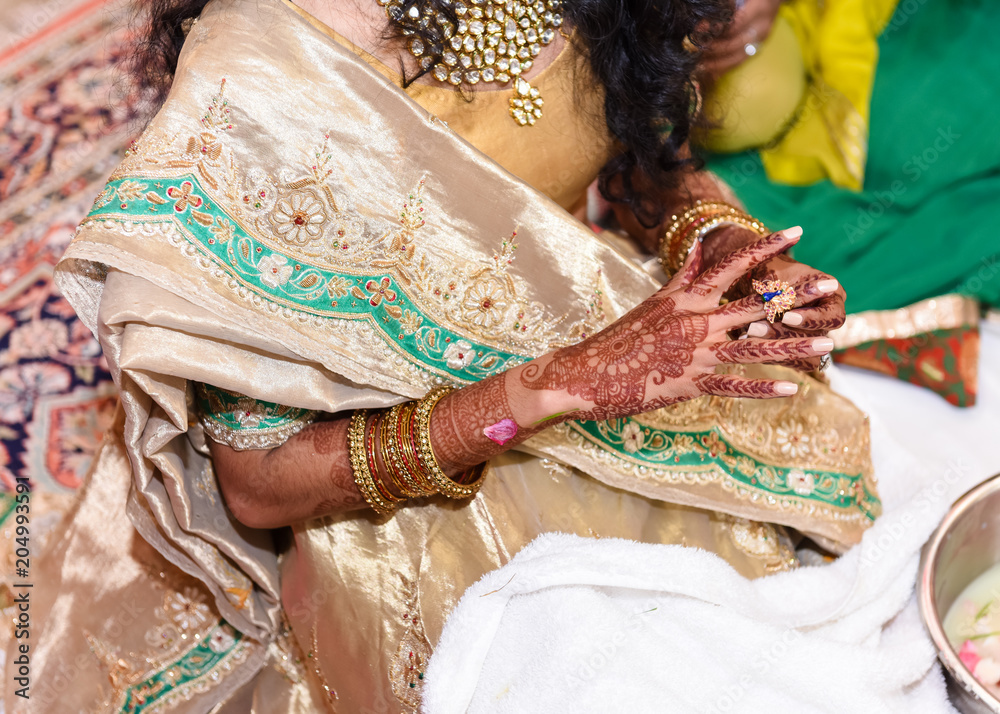 Close up of Hindu bride with Henna tattoo 