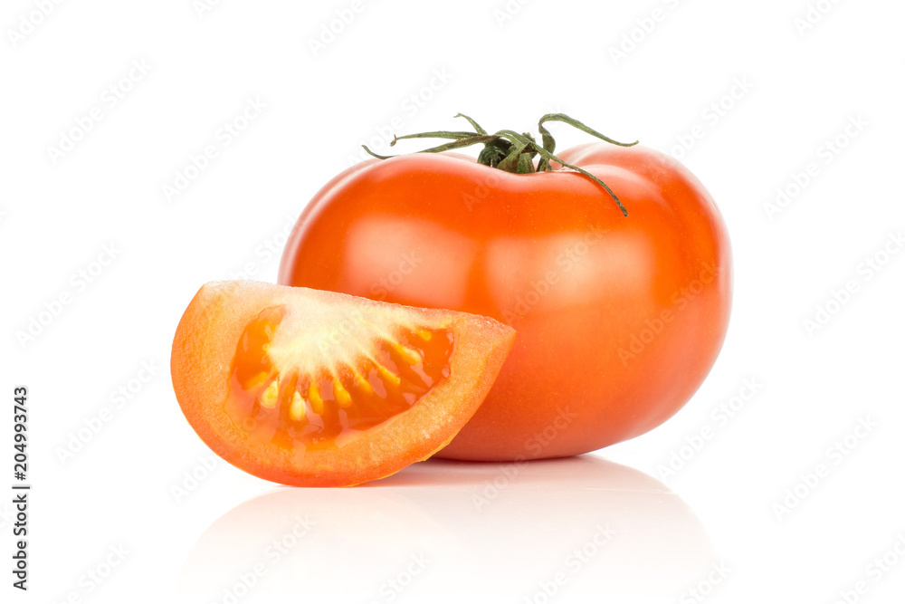 Red tomato and one slice isolated on white background. Red tomato and one slice isolated on white background.