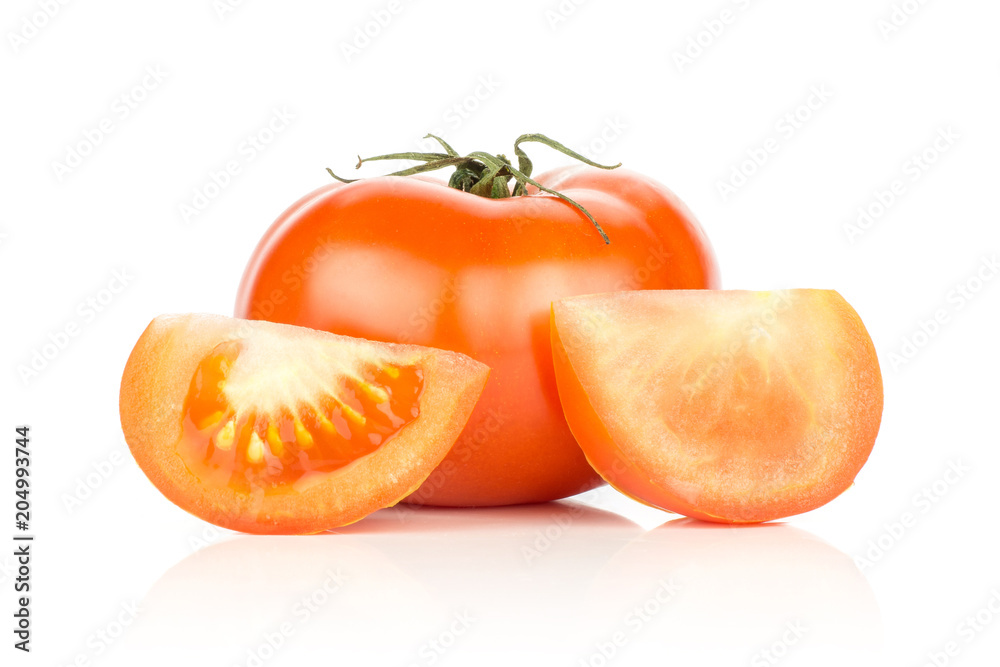 Red tomato and two slices isolated on white background. Red tomato and two slices isolated on white background.