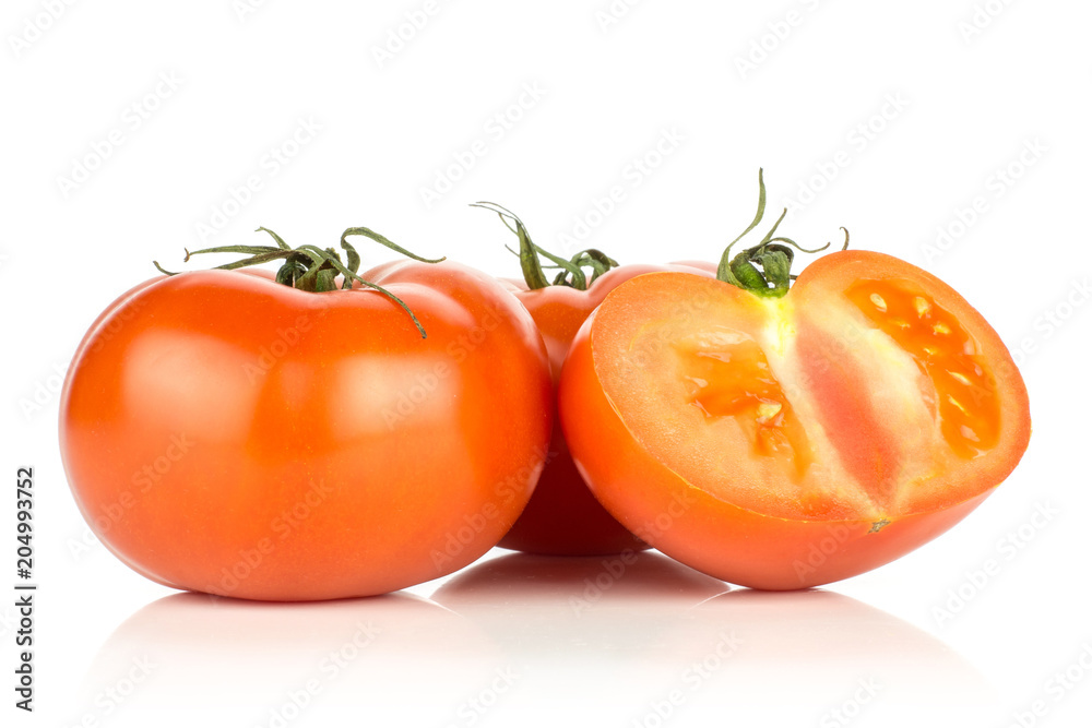Two red tomato and one half isolated on white background. Two red tomato and one half isolated on white background.