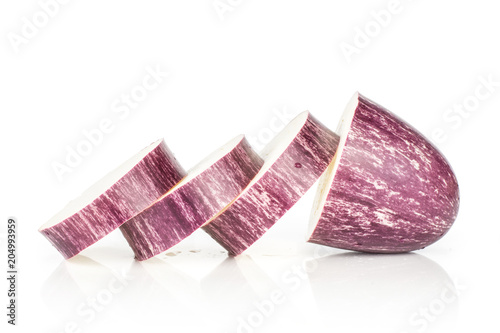 Sliced striped purple eggplant isolated on white background three rings. photo