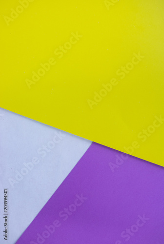 Contrasting colors yellow and purple angled geometric background