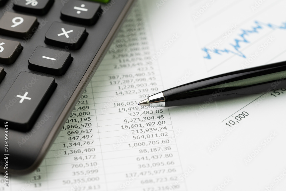 Investment, financial equity, stock exchange price index concept, calculator, pen on price numbers report with graph and chart on table Investment, financial equity, stock exchange price index concept, calculator, pen on price numbers report with graph and chart on table
