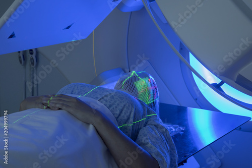 Woman Receiving Radiation Therapy Treatments for Cancer photo