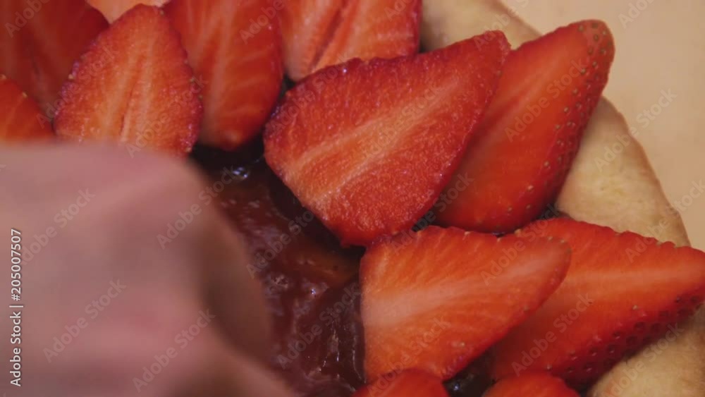 Fresh strawberries on cake, close up Fresh strawberries on cake, close up
