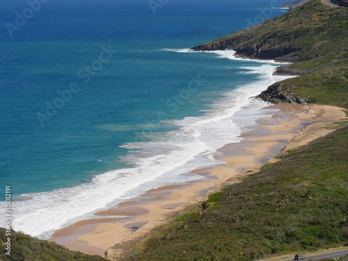 Scenic beach Coastal view with a beautiful beach  mesmerizing waves rolling up to the deserted shores
