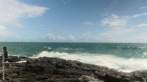 In a hot sunny day by the ocean, the waves hit the rocks.
Original Author: Danny Feng
www.hellodannyfeng.com photo