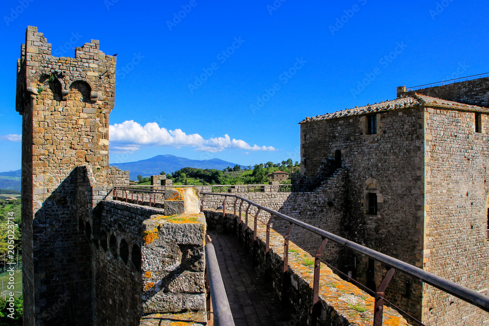 Tower and wall of Montalcino Fortress in Val d'Orcia, Tuscany, Italy