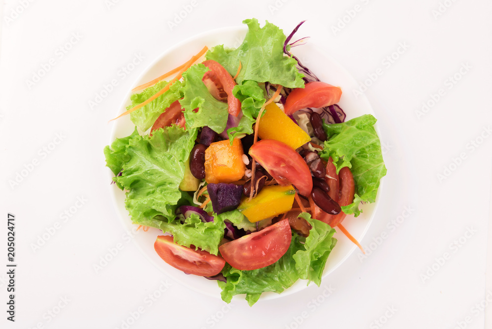 Vegetable salad isolated on white background. Vegetable salad isolated on white background.