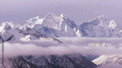 Time Lapse of Kangtega peak (6782 m) at sunrise. Nepal, Himalaya mountains. photo