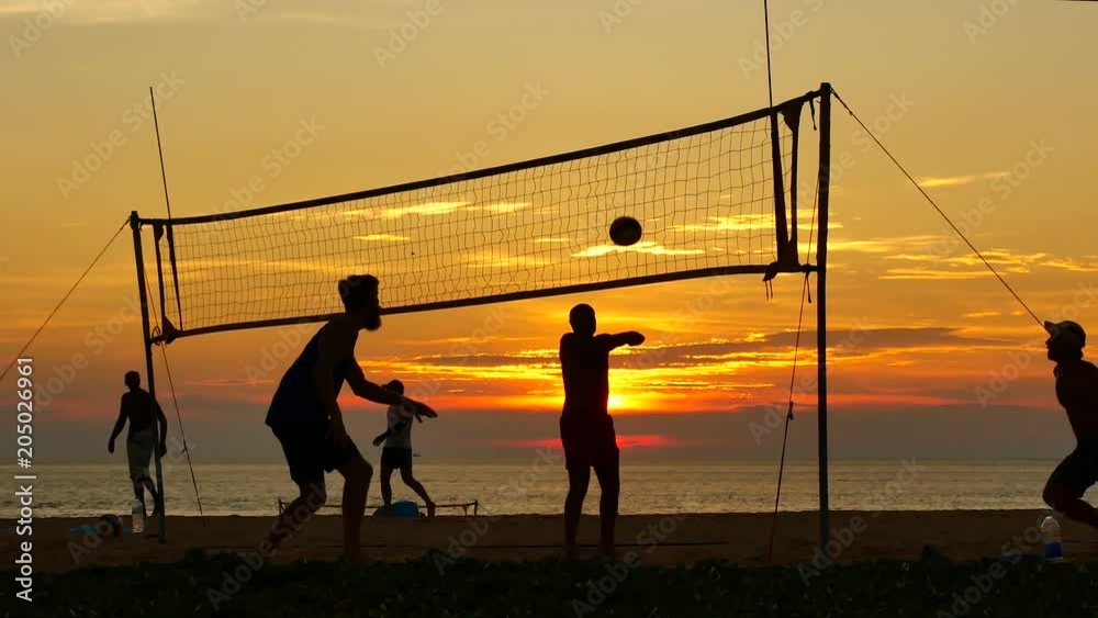 custom made wallpaper toronto digitalTravel Video group of silhouette people playing volleyball on the beach at sunset time in sport reaction concept.