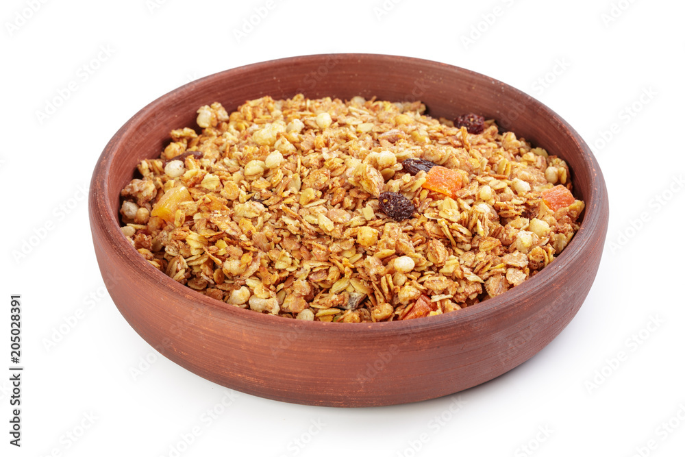Bowl of whole grain muesli isolated on white background Bowl of whole grain muesli isolated on white background