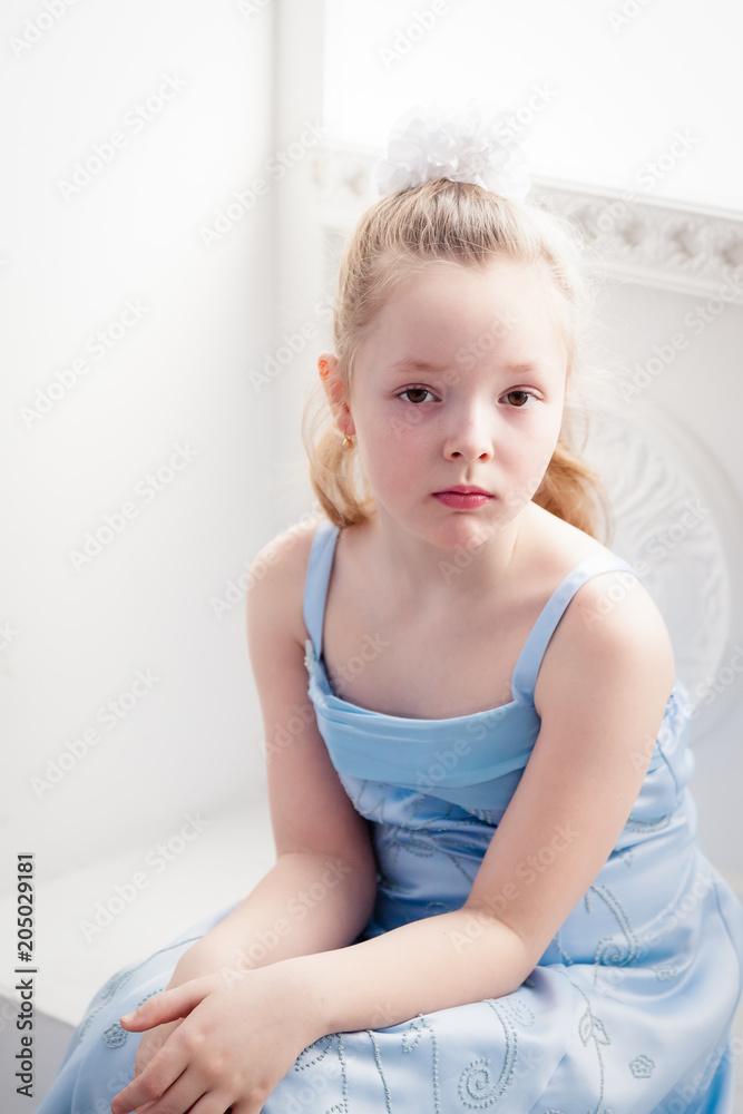 Portrait of a girl with a white bow in her hair Portrait of a girl with a white bow in her hair