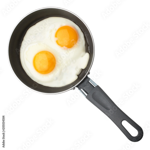 Fried eggs on griddle
