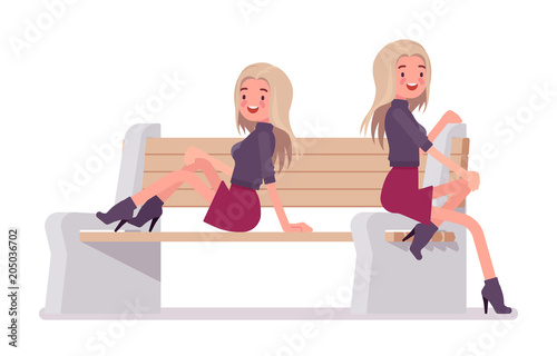 Young woman posing on bench