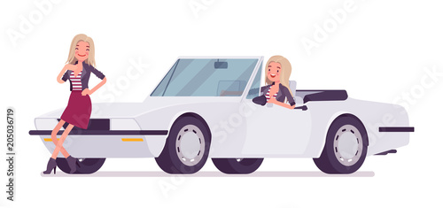 Young woman at cabriolet car