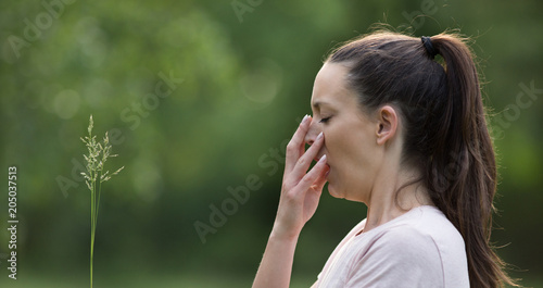 Girl having allergy reaction in park