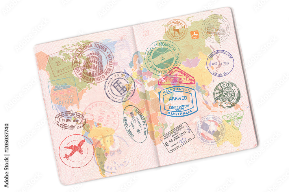 Passport and lot of stamps on it. Isolated on white background Passport and lot of stamps on it. Isolated on white background
