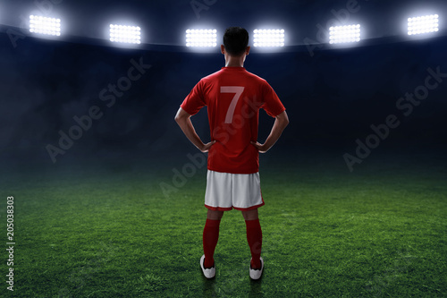 Soccer player standing on the field