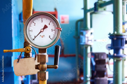 The pressure gauge for pressure shows zero. Abstract background.