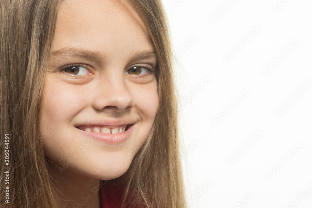 Close-up portrait of a smiling teenage girl Close-up portrait of a smiling teenage girl