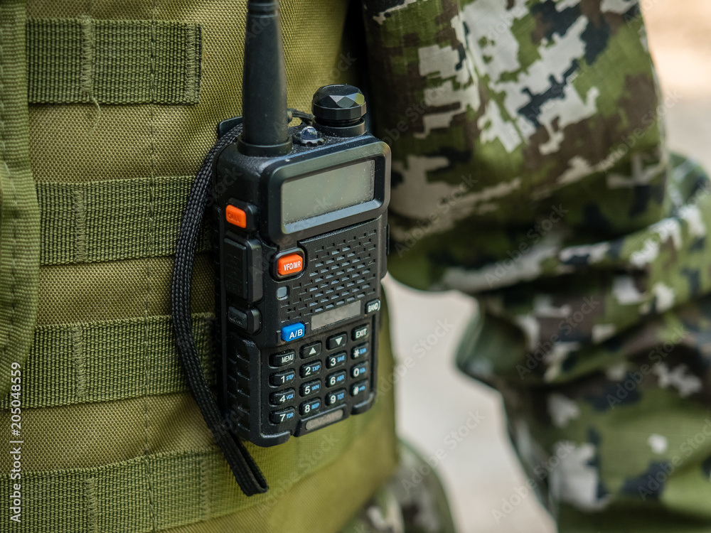 Portable walkie-talkie of a military officer, a special police officer, a  policeman foto de Stock | Adobe Stock