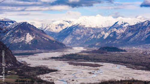 The slow flow of the Tagliamento river cradled by its mountains. © Nicola Simeoni