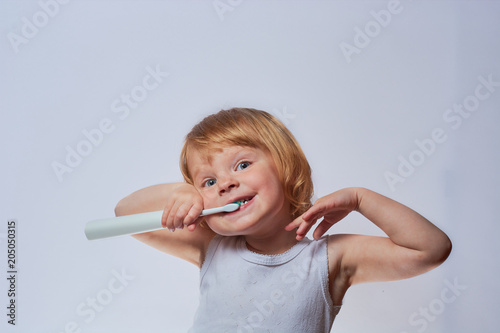 baby brushing her teeth