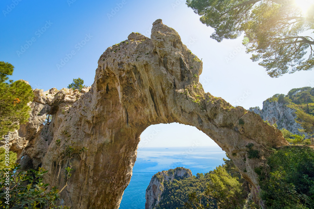 Arco Naturale is natural arch on coast of island of Capri, Italy