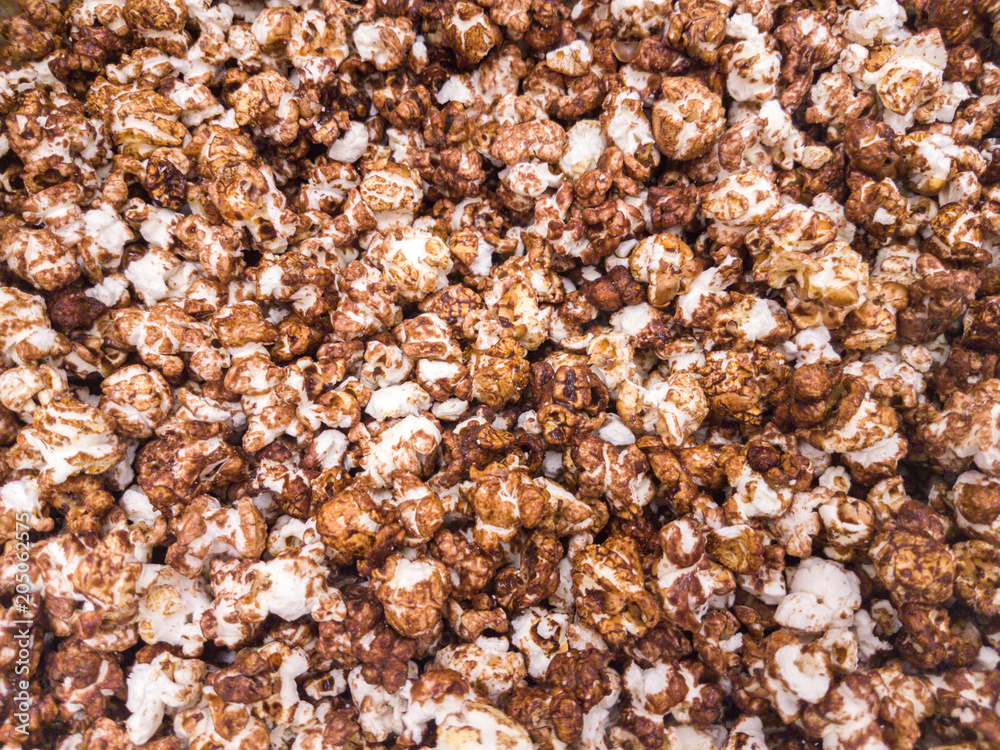 Scattered salted popcorn, texture background. Scattered salted popcorn, texture background.