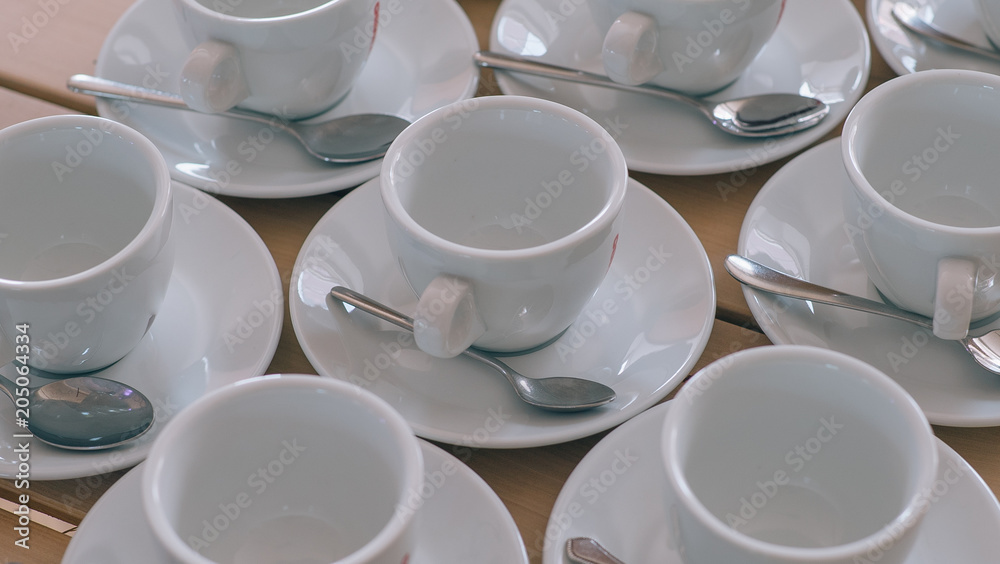 White coffe cups on the wooden table White coffe cups on the wooden table