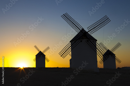 Silhouettes of traditional windmills at Campo de Criptana site, Spain