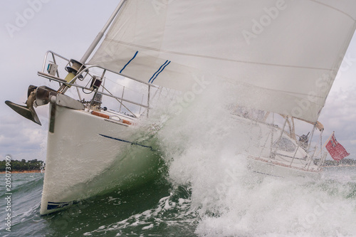 Sailing Boat Yacht in Rough Sea Waves